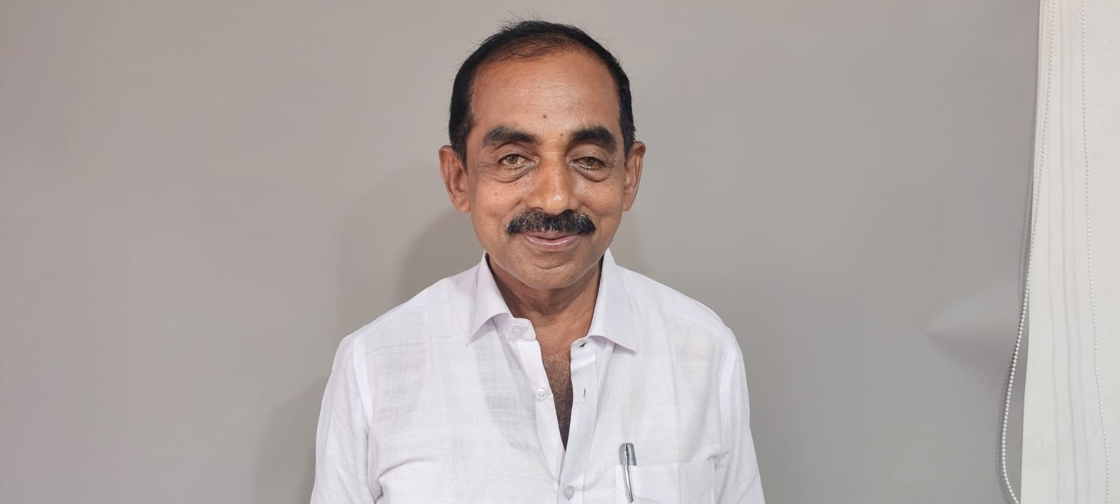 Raveendran K, Board Director of Perumatty Service Cooperative Bank